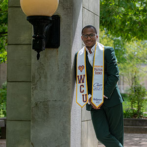 Student standing infront of archway thumbnail