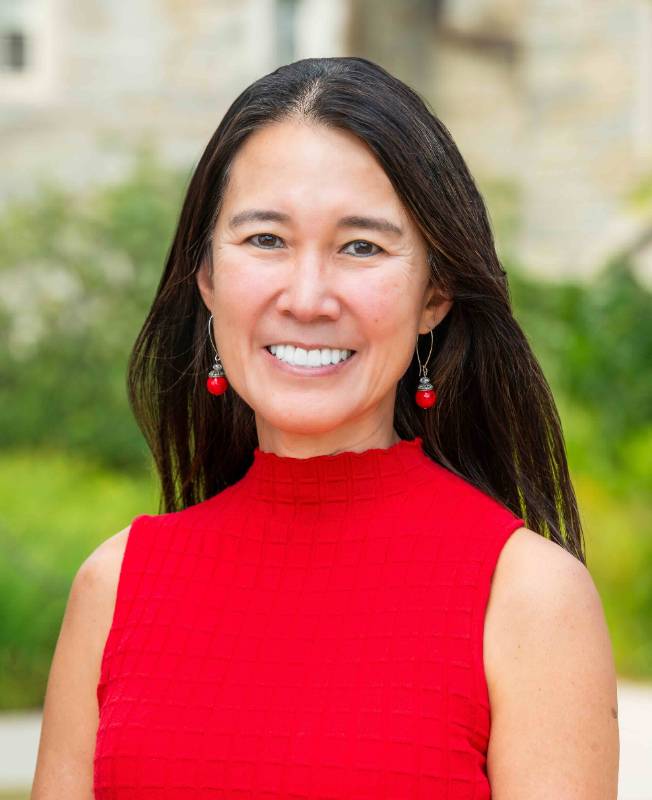 Headshot of Bessie Lawton in red top
